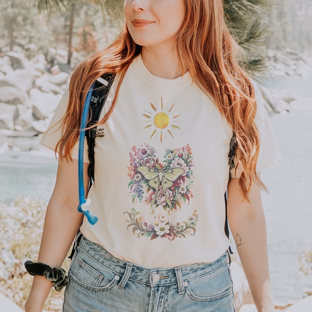 Pale Moth Resting in a Floral Wreath Under the Sun Tee